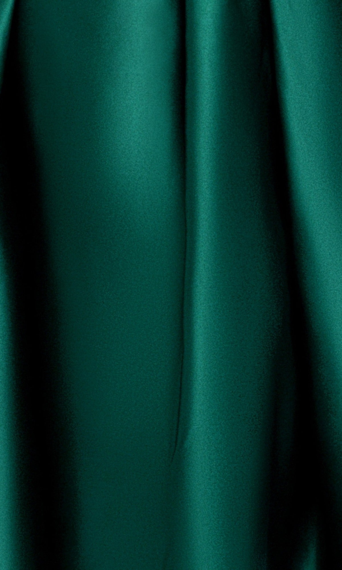Close-up of emerald green satin fabric with subtle folds creating a smooth and slightly shiny texture, perfect for the Plus-Size Mini Hoco Dress: Blondie Nites 6322BNW.